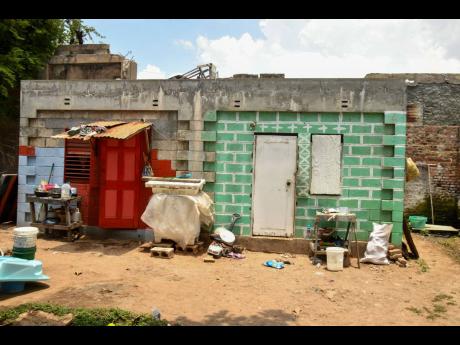 One of the houses that will be demolished for the construction of new houses on Hanover Street, Kingston.