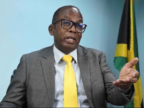 Director of Elections, Glasspole Brown