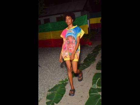  A model struts her stuff along the banana leaf-lined runway.