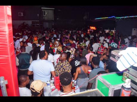 Credit: Anthony Minott Photos Patrons enjoying a recent party in the Corporate Area.