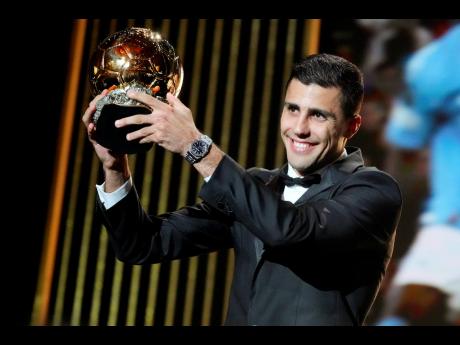 Credit: AP Spanish player Rodri receiving the 2024 Men’s Ballon d’Or award.