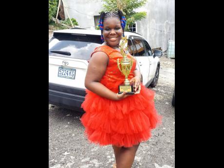 Credit: Contributed Kahlaliah Moore aces CSEC English language in grade seven.