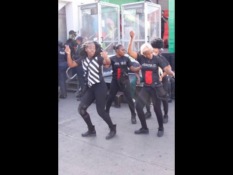 Credit: Contributed The JustBet promo girls brought the energy and vibes to Half-Way Tree, keeping the crowd hyped and moving during the Ballin with JustBet outside broadcast at the Half-Way Tree Transport Centre.
