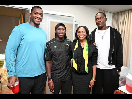 Credit: Gladstone Taylor Her excellency Shorna-Kay Richards (second right), Jamaica Ambassador to Japan, with Jamaica’s athletes (from left) - discus thrower Ralford Mullings, sprinter Oblique Seville and long jumper Nikaoli Williams.