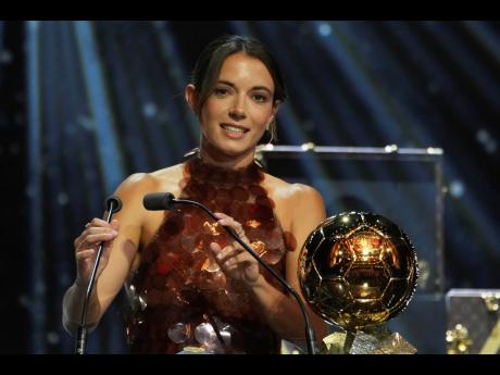 Barcelona’s Aitana Bonmatí receives the 2025 Women’s Ballon d’Or during the 69th Ballon d’Or awards ceremony at the Theatre du Chatelet in Paris, Monday, Sept. 22, 2025. (AP Photo/Thibault Camus)