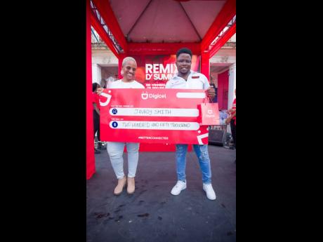 It’s all smiles as Nicholette McFarlane (left), head of marketing at Digicel, joins Remix D’Summa DJ Competition winner Javroy ‘DJ Javv’ Smith in celebrating his $250,000 prize.