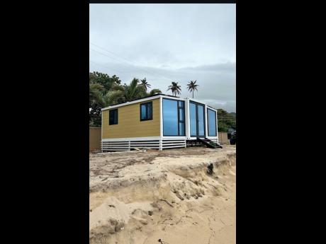Credit: Photo from @islandimportsja One of Island Imports Limited's prefab home.