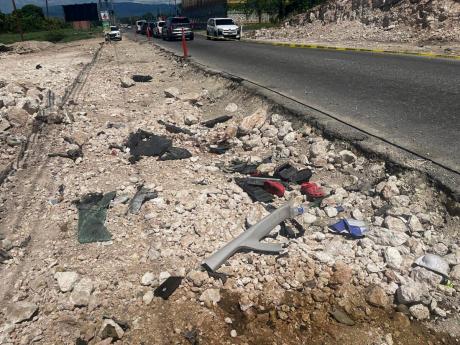 Credit: Almando Smith The crash site along the Hellshire main road in St Catherine bore grim reminders of Saturday morning’s tragedy.