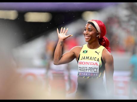 Credit: Gladstone Taylor Jamaica’s Shelly-Ann Fraser-Pryce waves goodbye to the crowd prior to the start of the women’s 4x100m relay final at the World Athletics Championships, at the Japan National Stadium in Tokyo, Japan, on Sunday, September 21, 2025.