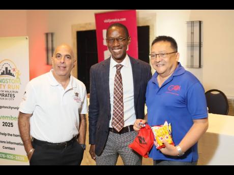 From left: Peter Shoucair, executive producer, Kingston Pirates Week; Christopher Jarrett, managing director – Altamont Court Hotel, president of the Jamaica Hotel & Tourist Association, and co-founder of Kingston City Run; and Dave Chin Tung, CEO, Go Jamaica Travel, at the recent launch of Kingston Pirates Week and Kingston City Run 2025.