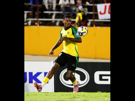 Dujuan ‘Whisper’ Richards abou to take control of the ball during Tuesday night’s Concacaf World Cup Qualifying football match against Bermuda at the National Stadium in Kingston. Jamaica won 4-0.