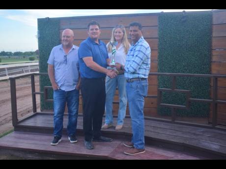Connections for the Raddesh Roman-ridden Nigel B. Nunes Memorial Cup during the trophy presentation at Caymanas Park on Saturday.