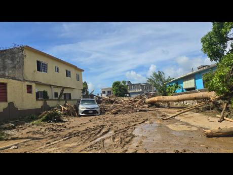 Credit: Janet SilveraJanet Silvera Thick mud blocks the entrances to homes in Westgreen, Montego Bay, St James, following the passage of Hurricane Melissa.