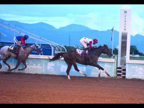  IS THAT A FACT (right), ridden by Shaheem Gordon, wins the Errol ‘Big Sub’ Subratie Memorial Trophy over a mile ahead of RUN JULIE RUN (Dane Dawkins)  at Caymanas Park on October 18, 2025.