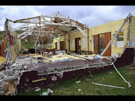 Credit: Ricardo Makyn Damage at New Works Infant School in Westmoreland shows the destructive power of Hurricane Melissa, which made landfall as a Category 5 storm.