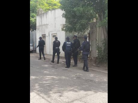 A police team patrols a section of the Corporate Area.
