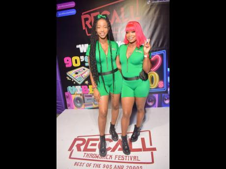 Credit: Anthony Minott Stone Ginger Wine beauties Kayla Mills (left) and Simone Lewis turned in an eye-catching shift at Recall Throwback Festival recently.
