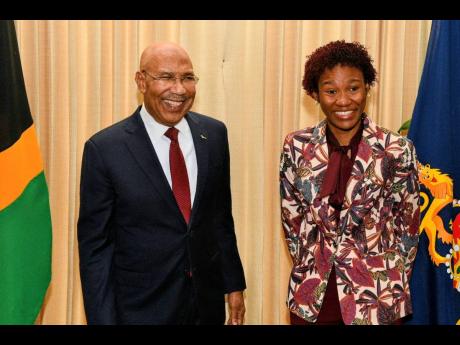 Credit: Antwaine Campbell Governor-General, His Excellency the Most Honorable Sir Patrick Allen, shares a light moment with 2026 Rhodes Scholar, Tiana Dinham, during the official announcement ceremony at King’s House on November 13.