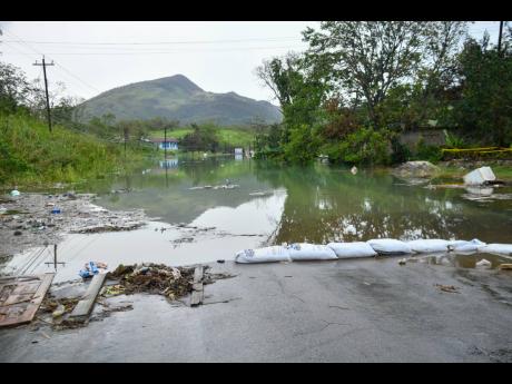 A flooded area of Content, Williamsfield, Manchester.