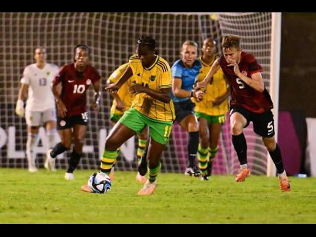 Credit: Gladstone Taylor Khadija Shaw dribbles with the ball during the Reggae Girlz’s football match against Canada at the National Stadium on Friday, September 22, 2023.