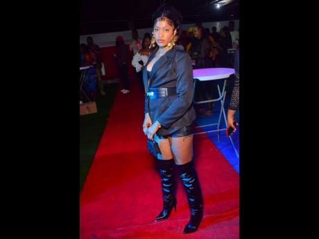 Sher Don is sexy in black thigh-high boots at Ras Gregg’s Soul to Soul party at the Don P Entertainment Complex in Job Lane, Spanish Town, St Catherine.