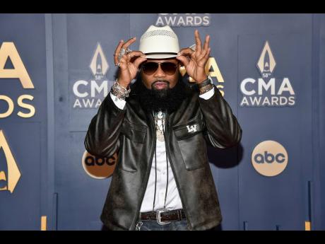 Blanco Brown arrives at the 58th Annual CMA Awards on Wednesday, November. 20, 2024, at Bridgestone Arena in Nashville, Tennessee.