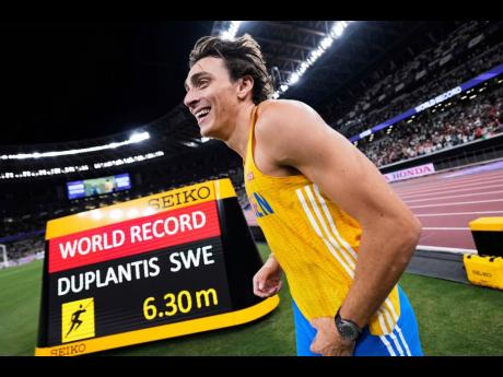 Credit: AP Sweden’s Armand Duplantis reacts after winning gold and setting a world record in the men’s pole vault final at the World Championships in Tokyo, Japan on Monday, September 15.