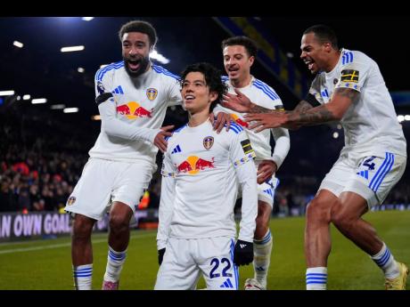 Credit: AP Leeds United’s As Tanaka (centre) of japan celebrates scoring his side’s second goal against Chelsea during their English Premier League soccer match in Leeds, England, yesterday.