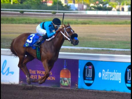 Credit: File DESERT OF MALIBU, ridden by Raddesh Roman, wins the ST CECELIA Cup a three-year-old and upwards Open Allowance Stakes over 6 1/2 furlongs at Caymanas Park on Saturday, March 23, 2024.