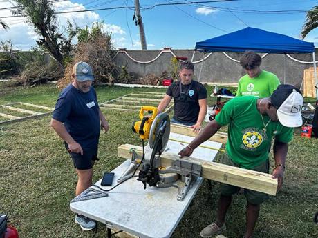 Credit: Contributed Ground Force members at work cutting wood.