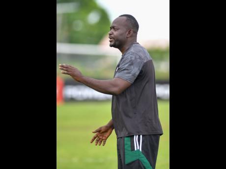 Credit: Matthew McKoy McGrath High School’s head coach Jermaine Thomas.