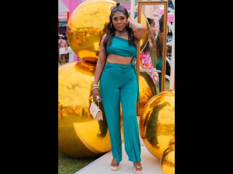 Entrepreneur Sofia Taylor steps out in a sleek teal two-piece pants set.