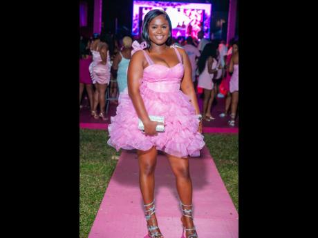 Credit: Contributed Registered nurse Imani Edman stands pretty in pink.