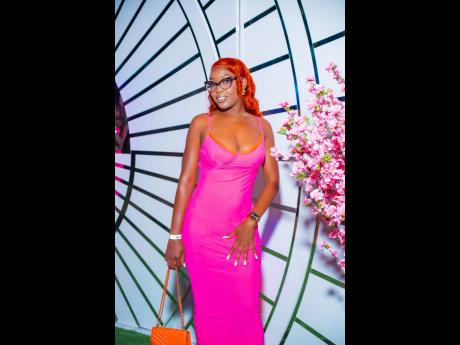 Credit: Contributed Brittany Brown mixed it up at Pic-Nic, pairing hot pink with a pop of orange in a sleek Dee Closet look.