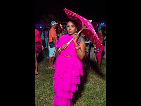 Credit: Contributed Catching our attention in pink tulle is Chavine Johns, who copped her ‘fit from local boutique Racks Off by Shampoo.