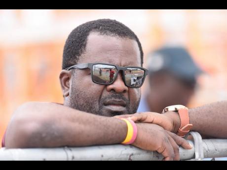 Dave Anderson, athletics coach at Holmwood Technical High School in Manchester.