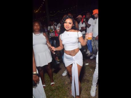 Credit: Anthony Minott Roshelle sparkles in white at Tea Cup, held recently in Rhymesbury, Clarendon.
