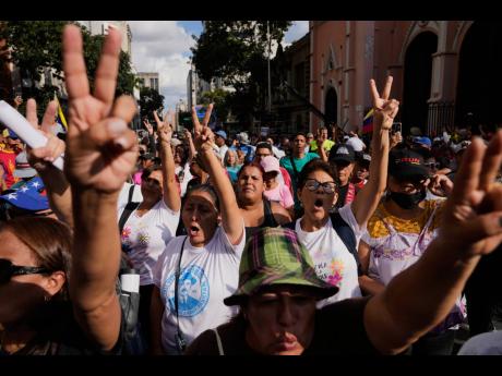 Credit: AP Photos Government supporters demand President Nicolas Maduro’s release from US custody during a protest in Caracas, Venezuela on Sunday.