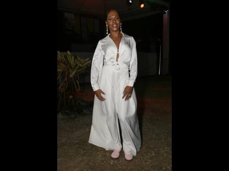 DJ Amber opts for an all-white ensemble as she rings in the New Year at Angola Festival.