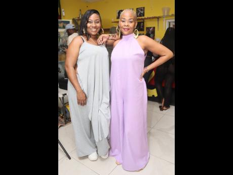 Vocalists Anna-Kim Myers (left) and Sandy ‘Symfoni’ Stewart of all-female group IREE-SiStar embrace island flair in relaxed, breezy looks.