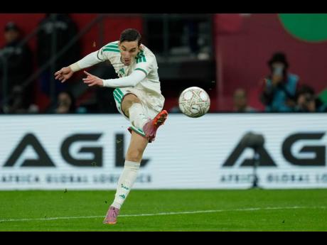 Algeria’s Adil Boulbina scores his side’s extra-time winner during the Africa Cup of Nations round-of-16  match between Algeria and DR Congo in Rabat, Morocco, yesterday.