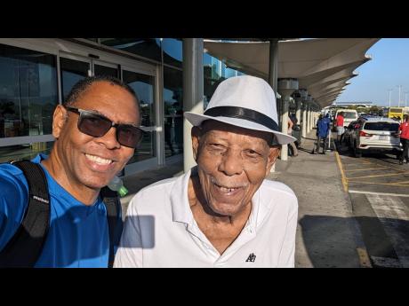 Abraham Worrell (right) with son Dwight.