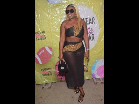 Credit: Anthony Minott Elisha, from London, basks in the attention.