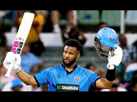 Credit: CMC Shai Hope celebrates scoring his century.