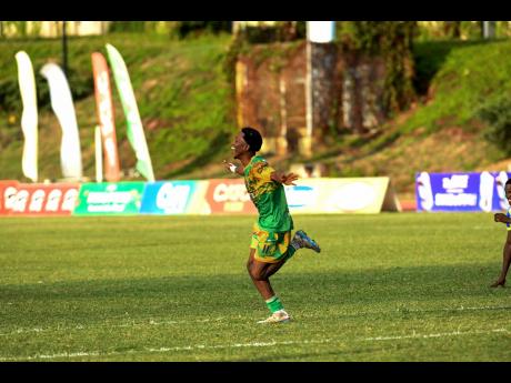 Kivann Salmon of Excelsior High School celebrates after scoring the clincher, the second goal of the match against St Elizabeth Technical High School in the Olivier Shield title showdown at Stadium East on Thursday. Excelsior won 2-0.