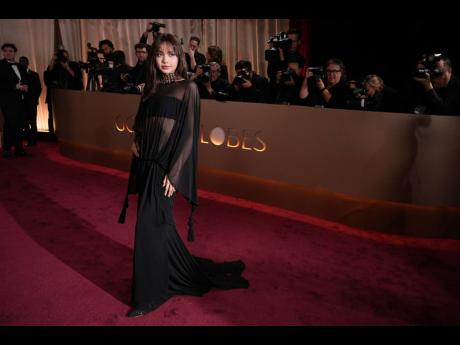 Lisa arrives at the 83rd Golden Globes on Sunday.
