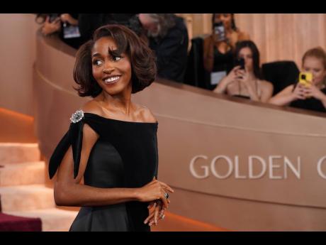 Ayo Edebiri makes an appearance on the Golden Globes red carpet.