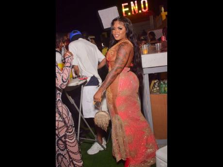 Queen Nikki shows her tats and more at Kelly Upsetter’s Fashion Night Out at the Pier, located on Port Henderson Road, Portmore, St Catherine.