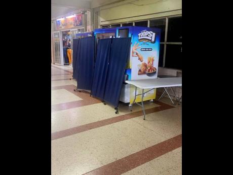 The Zoops vending machine in Spanish Town hits pause, and shoppers are left craving its juicy fried chicken.