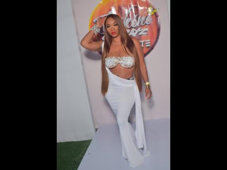 Credit: Anthony Minott/Freelance Photographer Lady Michelle slays in style, keeping it classy and camera-ready at Bikini Sundayz All-White Brunch at the Police Officers’ Club, 34 Hope Road, last Sunday night.